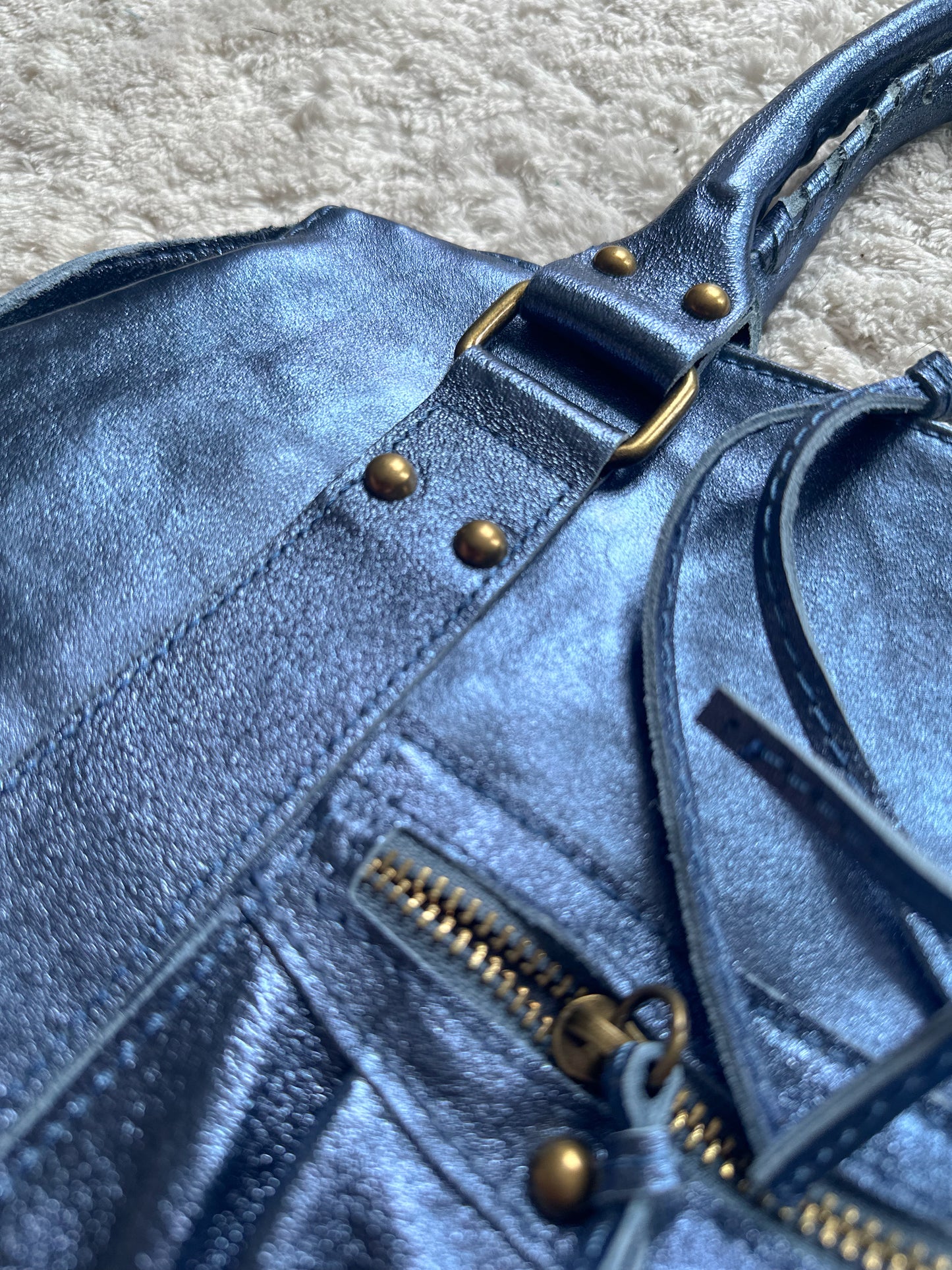 Tas City L - iriserend marineblauw